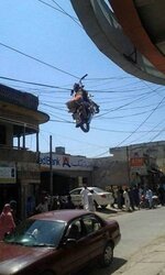 motorcycle-in-overhead-powerlines.jpg