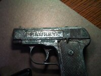close-up of hawkeye cap gun.jpg