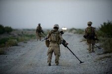 US Marines search for roadside bombs in Afghanistan Helmand province on July 13 2009.jpg