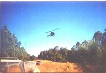 .JPGOUR HELICOPTER COMIMG INTO THE LANDING FIELD AT CEROCHIT.JPG