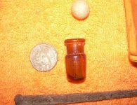 tiny jar (quarter is for size) clay marble.JPG