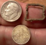 1950 silver dime, forein silver penni, and tiny buckle.jpg