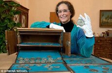 janitor-finds-gold-silver-coins-treasure-german-library.jpg