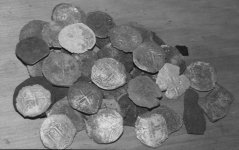 STA. Ecolastica silver coins.jpg