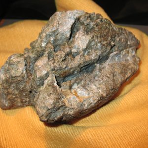 Found this Chunk of solid metal in a nearby river, likely melted aluminum but no foundry's of fire pits around the area. My very first discovery with 