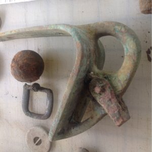 image 1472971450

Goes on the Bow of a small sailboat.
Grapeshot or Shotput ball?
Buckle