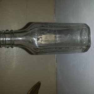20150724 A small bottle made in 1935 by Knox Bottle Company in Jackson, MS. It was found while digging the hoe blade in another photo on private prope