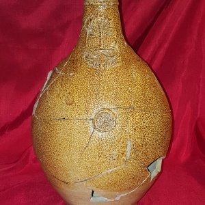 Reconstructed 17th century Bellarmine (aka Bartmann) jug. Shards dug from the "Swamp Pit"