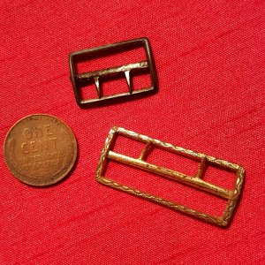 Two small brass buckles; probably used on clothing