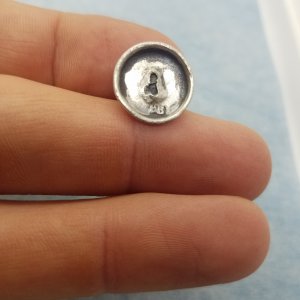 Silver colonial button
