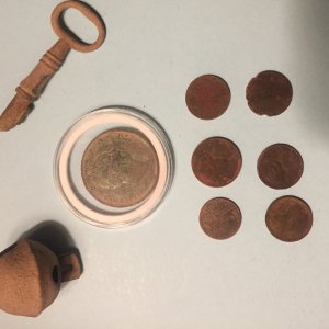 First hunt at new site! 1831 King William IV Penny, Skeleton Key, Crotal Bell and modern change. The only thing pictured cleaned is the penny.