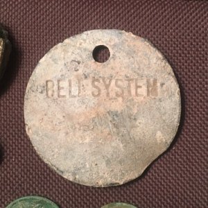 12-21. Bell System tag.
