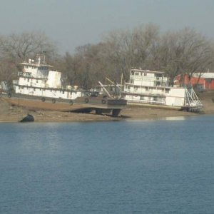 old boats - Here are a couple of old boats on the bank above Peoria lake on the Illinois river.