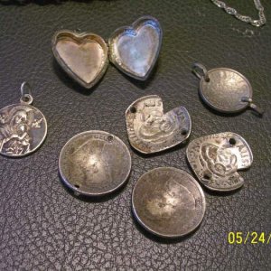 silver coin jewelry etc. - coins were found together in an old house under the floorboards several years ago.
