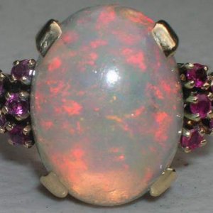 Opal Ring - This is a 14k opal ring with rubys.