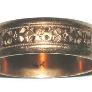 Fancy Gold Ring - This Fancy gold wedding band is 14k.