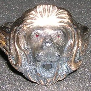 Lion Face Ring - This Lion face ring is made of brass & has rubys in his eyes & mouth.