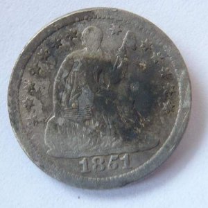 Oldest Coin Thus Far - I dug this baby in Cape Girardeau.  It's an 1851 O Seated Half Dime.  I may never find an older coin than this around here!