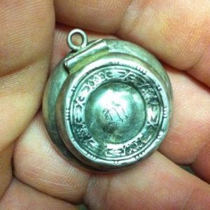 1900 Locket - Old Locket Filled with Coins...appear to all be wheat pennies.  Can't remove the coins though...they were forced inside.