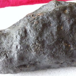 This particular stone weighed in at 1038 grams, slightly magnetic, has a "thumbprint" a shiny exterior, and a fire line on one side. I've been told th
