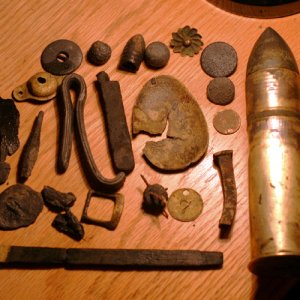 Items including a 37mm misfired
Hotchkiss shrapnel round.
From an 1870 design handcranked
autocannon