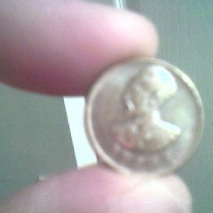 ethiopian    coin   with  haille  sallasie  on it.    bob marleys   guru