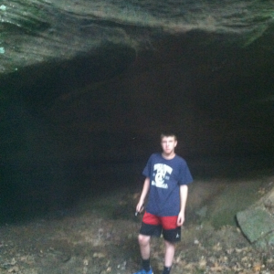 Little brother about to explore one of the larger caverns we found