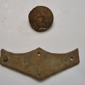 This is my Eagle Cavalry "C" Officer's button and Doug's batwing after redstoration by Robert McDaniel. He straightened both relics. These are from oo