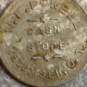 "W.E. Powell Cash Store Tecumseh O.T."
Better than a silver dollar IMO. Anything identifiable pre-1907 Oklahoma...is right up my alley.