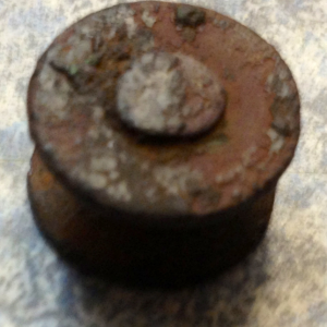 I've thought sword clasp, ear plug, overall button. Markings but can't distinguish. Cherokee Co. Rivet for all I know. Dig and research later. But sam