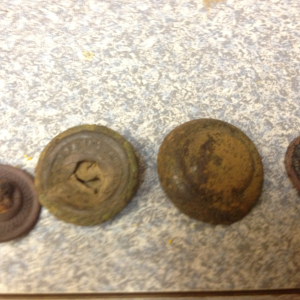 Backs of buttons. Cherokee Co.