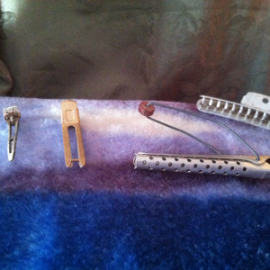 All are curling tools made in Hollywood. Also made of metal and aluminum. Two different types of clips ( pin curl clips and krippies) and metal curlin
