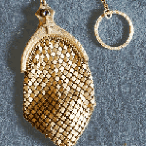 Extremely RARE - Tiny Brass Mesh Rosary Ring purse.
No makers mark, but suspect it is by Whiting & Davis. These are VERY RARE, with tiny brass rosary 