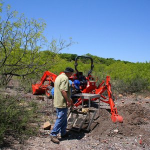 Backhoe and sifting in a Texas ghost town.