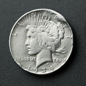 My first and only silver dollar in 19 years of detecting. Found it in a front yard in my second year.