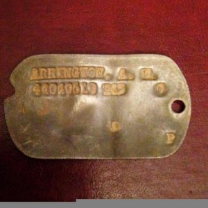 AE Arrington's dog tag.  WWII Veteran who sadly died only a few years ago.  Would like to return to next of kin.