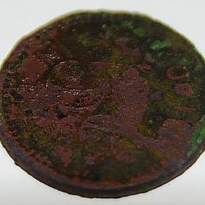 Unknown token.  I can make out a large 5 in the middle.  No date visible.
