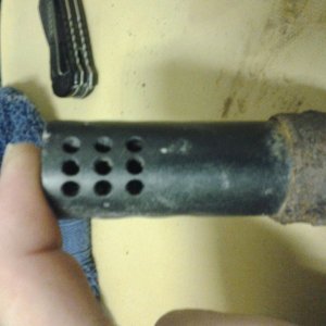 Not sure if it a silencer or suppressor and for what type of weapon. Found at the Ogden Pond