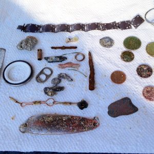 Oct 18 13 PP
Everything here was found on a  salt water beach in central NJ on a (hard packed sand) "coin line” all app 15" to 20" deep. The coins fou
