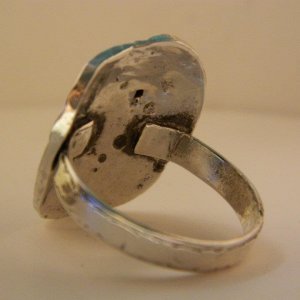 Inside view of abstract sterling silver and garnet ring