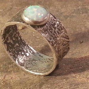 Another one of my favorites. Reticulated sterling silver with bezel set opal triplet