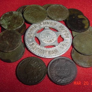 2 Indians, an aluminum good luck token, and a bunch of Wheaties found in Muskegon,  MI.