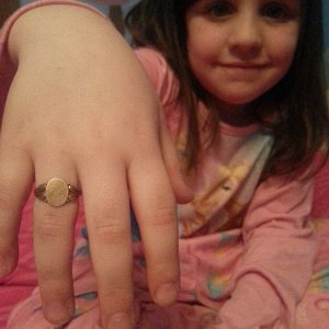 My Daughter With her New Treasure