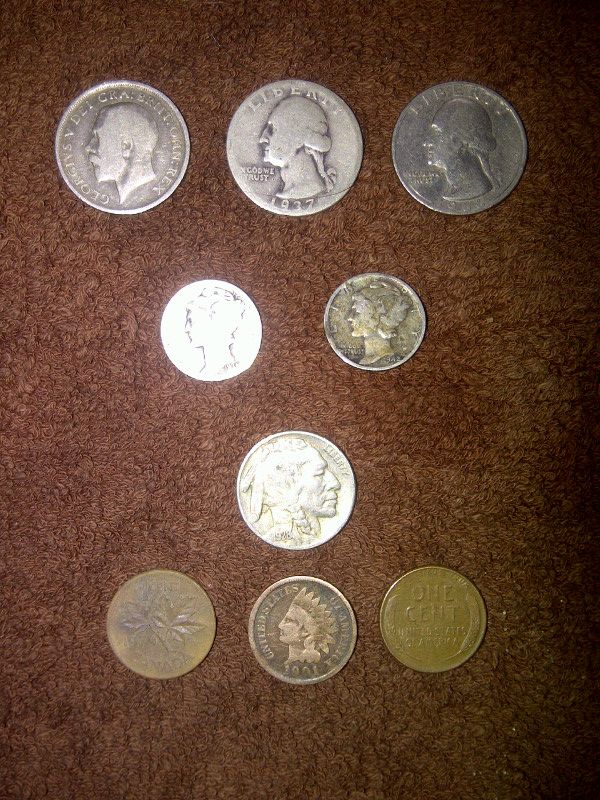 1914 king george one shilling...1937  quarter..1977 quarter..i know ..its not that old..but older than me..1935 and 42 liberty dimes.1928 buffalo nick