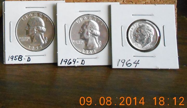 9-8-14 3 Silver coins found next to a lake parking lot.
