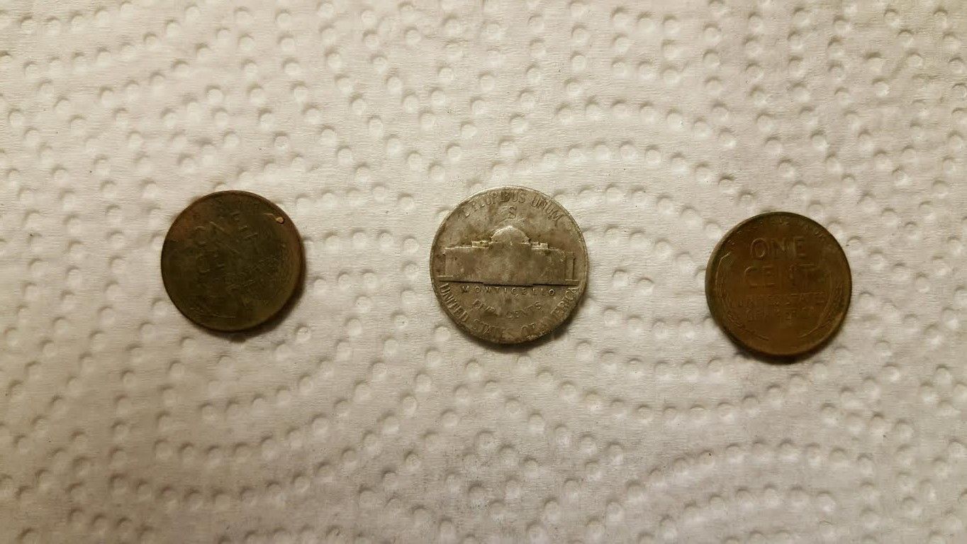 Back of the two wheats and the war nickel.