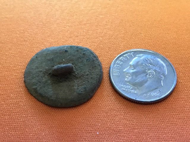 Button #2. Large. Shank side. Found with the XP DEUS on the other side of the James River. Could be colonial. Will post in forums for for ID. Shank st