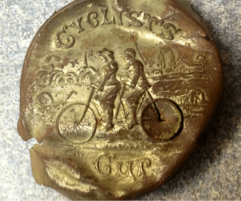 Cyclist Cup Lid. Circa 1885 Pott. Co.

Homestead west of twin lakes