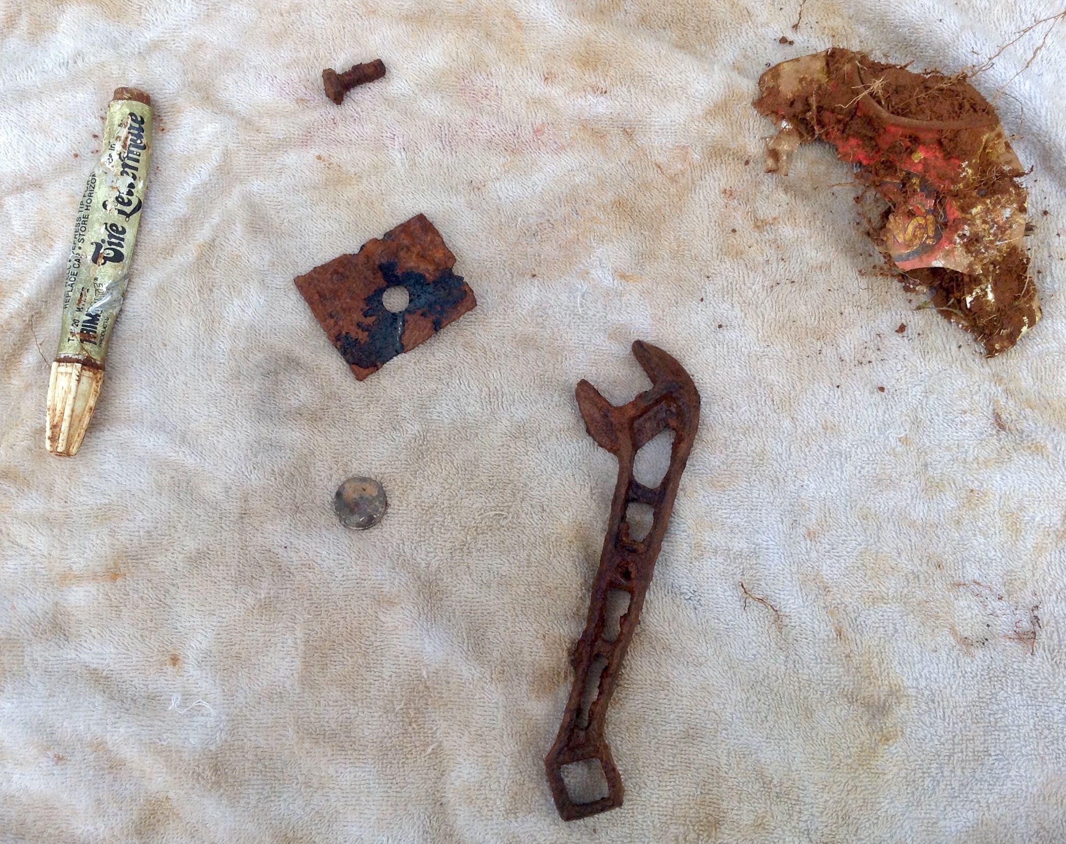 Finds for the day, Dec 21,2014, 1984 penny, tire paint marker, soda can, bolt, old tool, etc.
