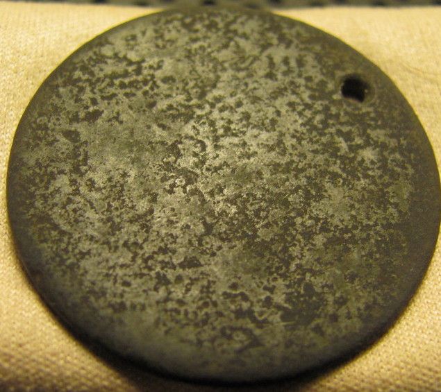 Holed and worn out large cent. Look at the base of the coin, see the "?" mark ~ LOL it's so old even it doesn't know it's age any longer :p  10/2012